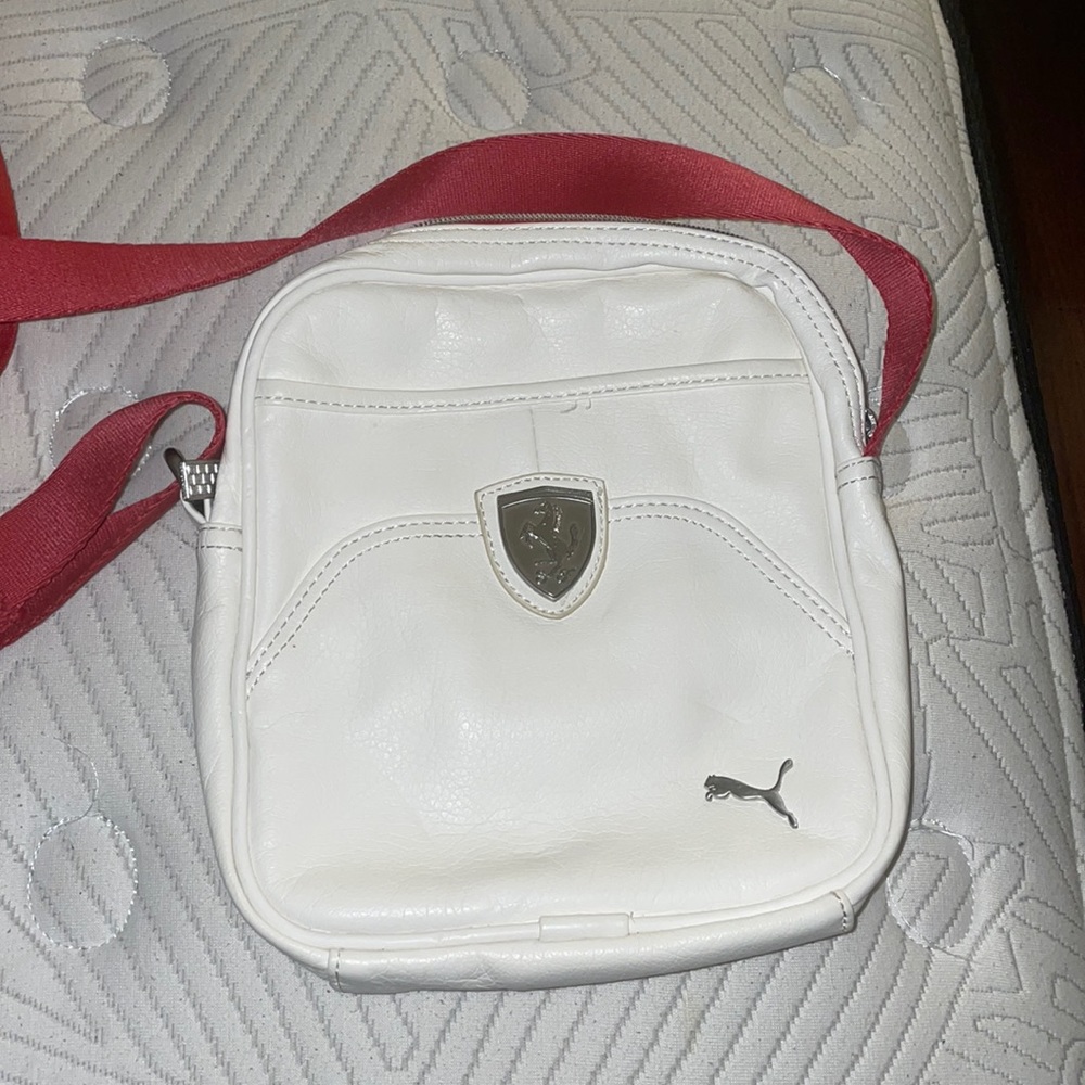 Limited addition puma X Ferrari Crossbody bag and white leather and red strap